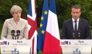 Theresa May merge înainte cu Brexitul, Macron îi spune…