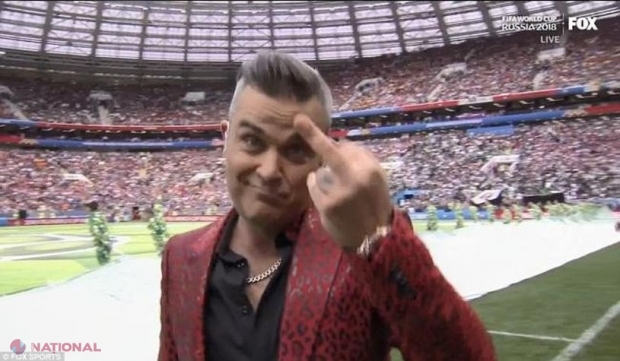 A cântat în deschiderea Mondialului, a şocat lumea prin gestul său suburban, iar acum plăteşte nota! „Robbie Williams şi-a VÂNDUT SUFLETUL lui Putin
