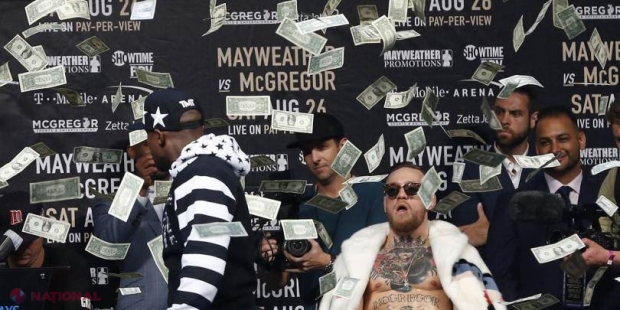 VIDEO // Mayweather a aruncat banii din rucsacul cu 100 de milioane DOLARI: „Dansează pentru mine, băiete”. Răspunsul lui McGregor