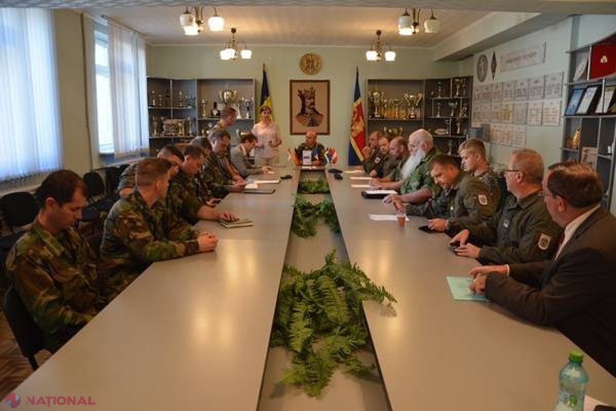 Experți din Austria, Germania și Suedia, alături de militarii Armatei Naționale, interesați de stocurile de armament și muniții din R. Moldova