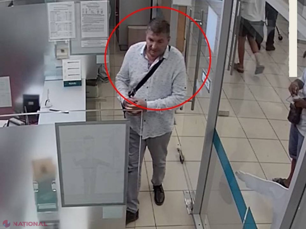 VIDEO // A intrat într-o bancă din Chișinău, a mințit casierița și a luat MII de lei: Îl recunoașteți pe bărbatul din imagine?