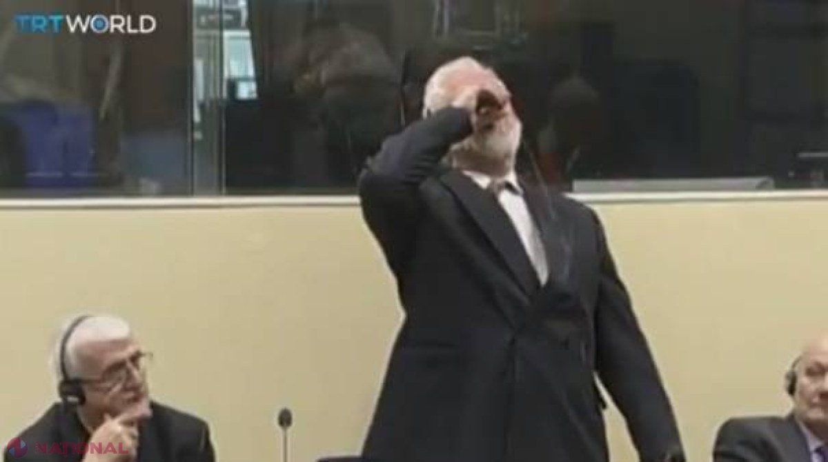 VIDEO // Un criminal de război a băut OTRAVĂ în timpul unei audieri. Momentul exact, surprins de camerele de luat vederi. Acesta a MURIT la scrut timp