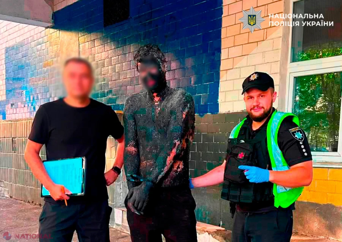 Hoț „invizibil” la Kiev: s-a uns cu smoală din cap până-n picioare ca să jefuiască un magazin și a fost curățat de polițiști în 5 ore