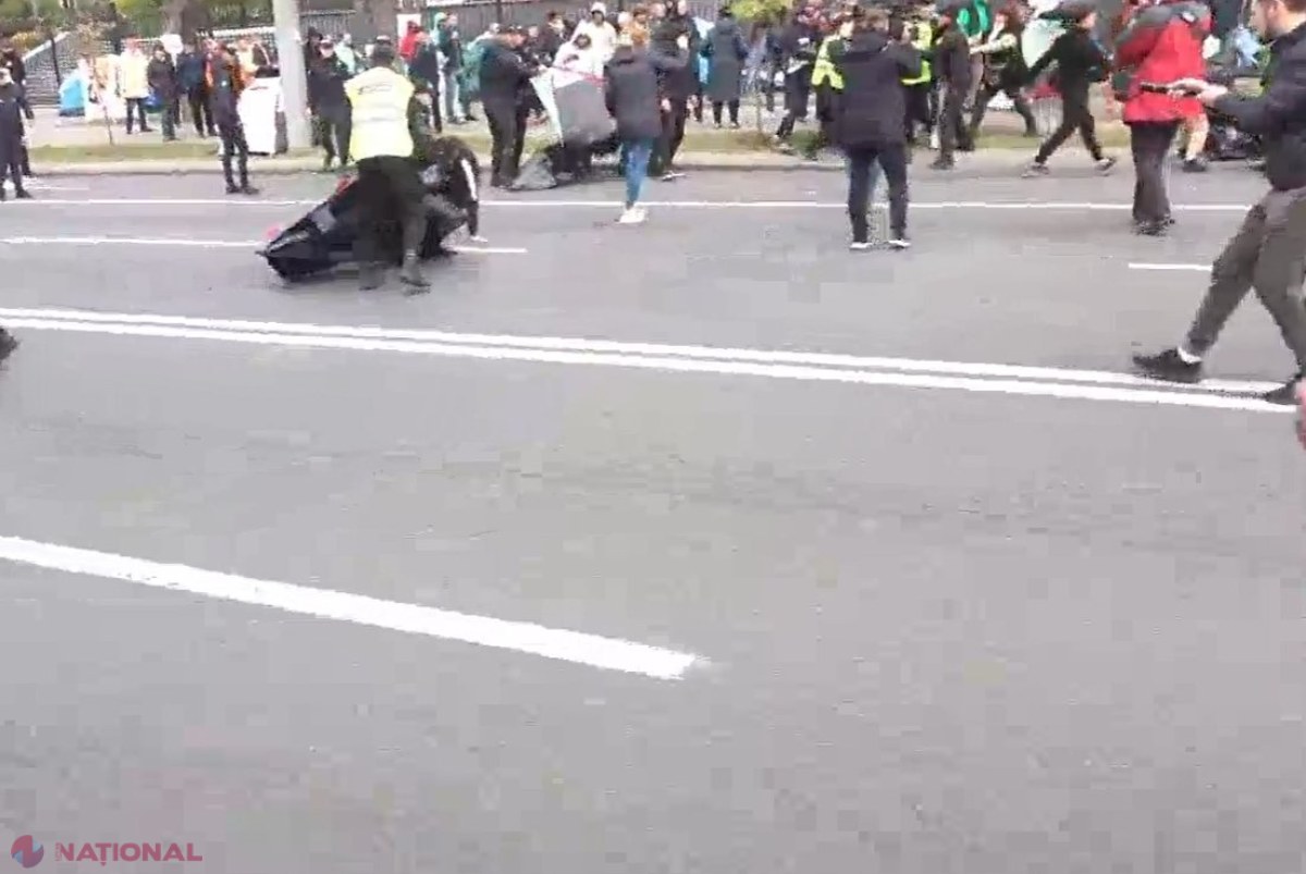 VIDEO // Altercații între POLIȚIE și protestatarii lui Ilan Șor, după ce aceștia au încercat să BLOCHEZE bulevardul Ștefan cel Mare cu zeci de CORTURI