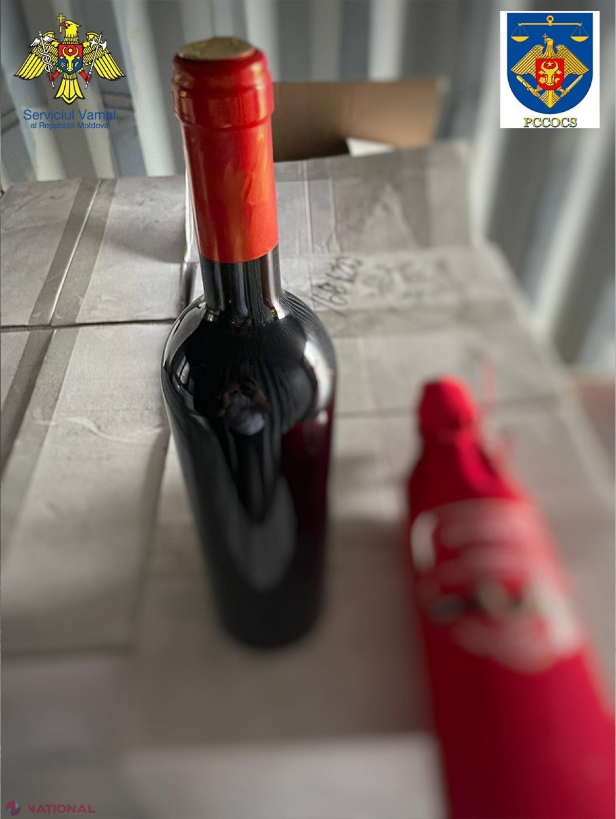 VIDEO, FOTO // Contrabandă cu vin georgian, care în acte era moldovenesc. Organizatorii schemei aveau un depozit plin cu vin și whisky, care era destinat exportului în SUA
