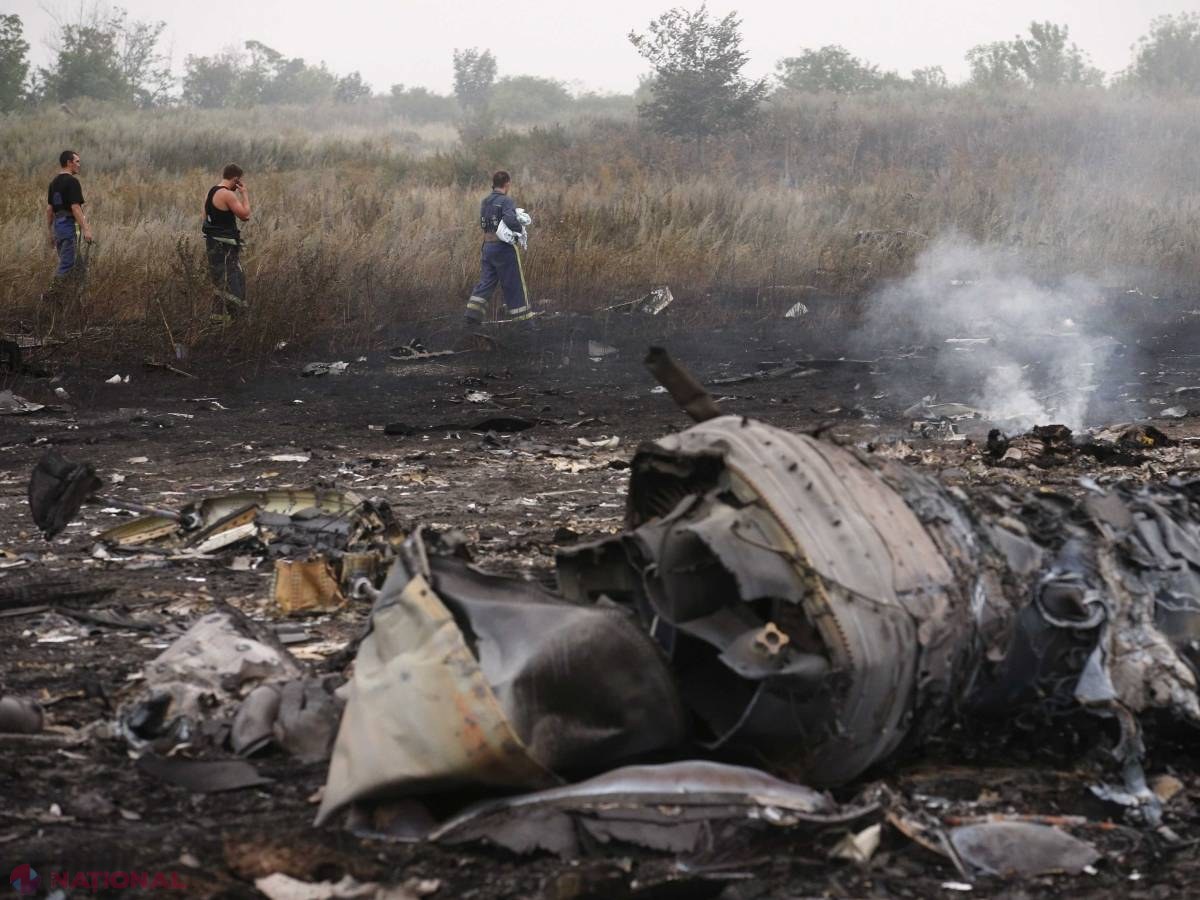 Ucraina acuză rebelii pro-ruși că JEFUIESC cadavrele. Oficialii din Malaysia au ajuns la Kiev
