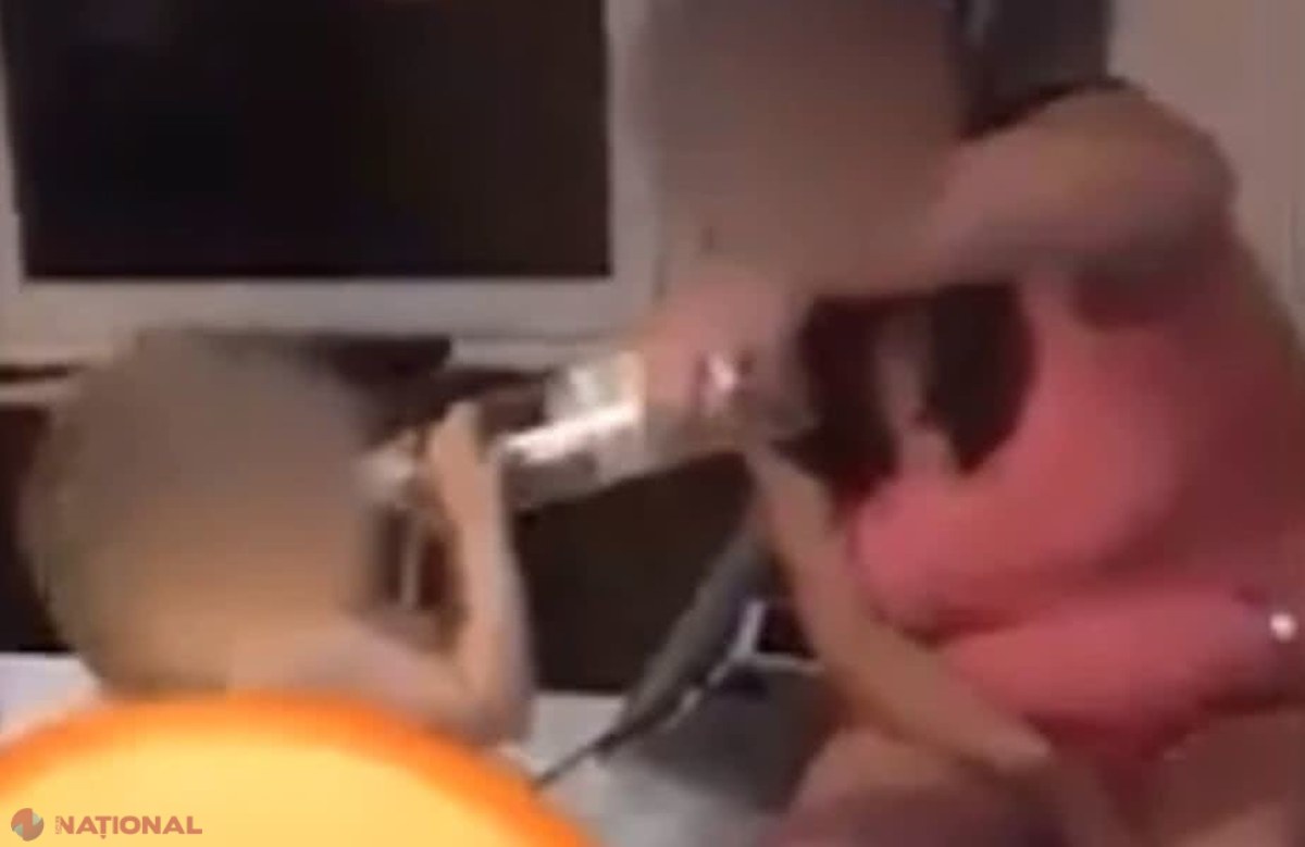 REVOLTĂTOR! // S-a filmat cum îi dă alcool unui bebeluș și a postat clipul pe internet