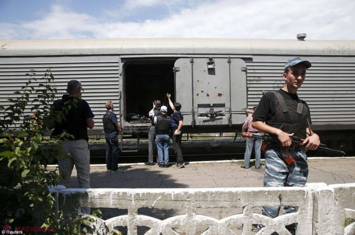 Salvatorii au găsit corpurile a 251 de pasageri din Boeingul doborât în Ucraina