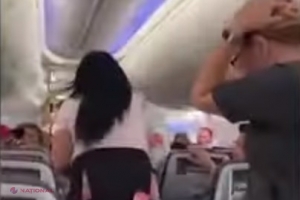 VIDEO // Gelozie la înălţime: Femeia, furioasă că partenerul se uita la alta, a făcut un gest total neaşteptat care i-a şocat pe pasageri 