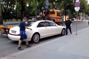 VIDEO // I-a UMILIT pe polițiștii locali. Un Maybach parcat ilegal nu poate fi ridicat de mașina de tractare!