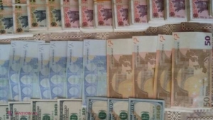 Moldoveni reținuți în România cu mii de euro FALȘI. Un cunoscut fotbalist de la noi, membru al grupării