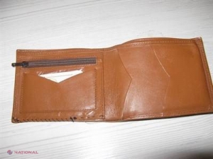 A cumpărat un portofel de la second hand şi când l-a deschis a încremenit