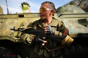 Sute de bărbați înarmați BLOCHEAZĂ orașul Lugansk, fieful separatiștilor ucraineni