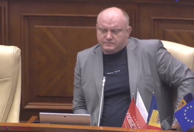 FOTO // Vladimir PUTIN, suspectat de CRIMĂ de război, adus de Vasile Bolea în Parlamentul R. Moldova