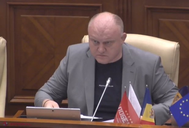 FOTO // Vladimir PUTIN, suspectat de CRIMĂ de război, adus de Vasile Bolea în Parlamentul R. Moldova