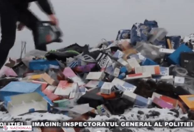 VIDEO // Marfă de branduri cu renume, ARSĂ de polițiști