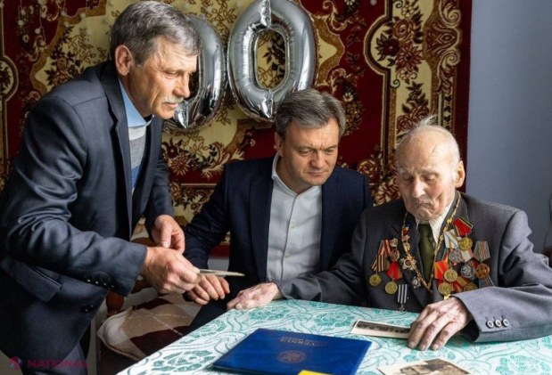 Veteran al celui de-al Doilea Război Mondial în vârstă de 100 de ani, vizitat de premierul Dorin Recean: ,,Datoria noastră este să păstrăm pacea pentru care bunicii și străbunicii noștri au luptat