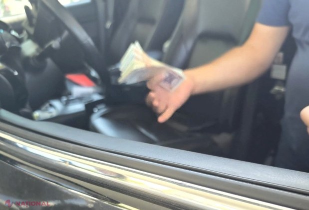 FOTO // Un polițist a fost săltat de mascații de la CNA, pentru o mită de 5 000 de lei. „Omul legii” a fost DENUNȚAT chiar de cel căruia i-a cerut banii
