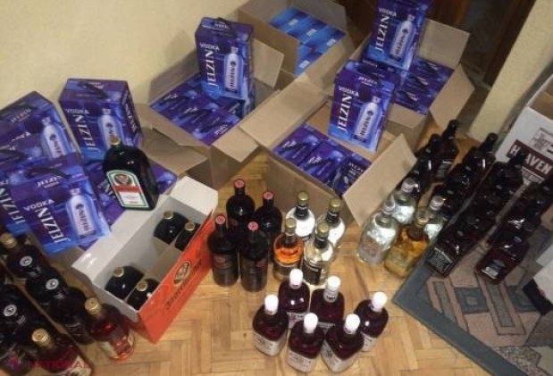 „Jack Daniels”, „Jim Beam”, „Finlandia”, „made in Moldova”. Patru bărbați din capitală, săltați de polițiști