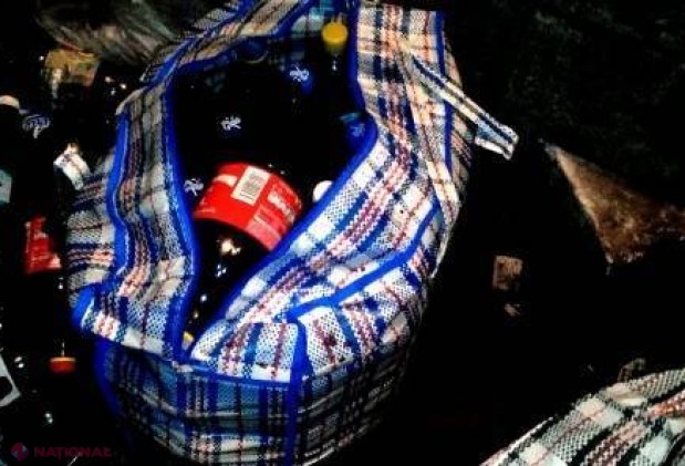 Circa trei tone de vin contrafăcut, depistate într-un depozit clandestin din Chișinău