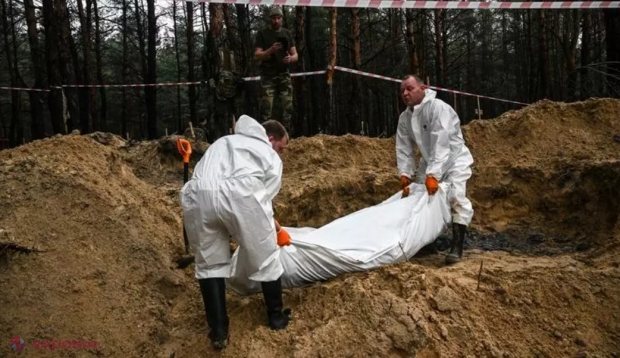 Autoritățile ucrainene au găsit încă două gropi comune cu „sute de cadavre” în Izium
