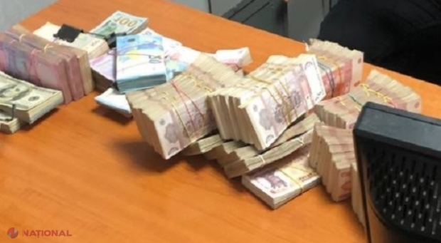 Casă se schimb valutar „SECRETĂ” la Bălți: Banii proveneau din acțiuni de contrabandă cu produse cerealiere