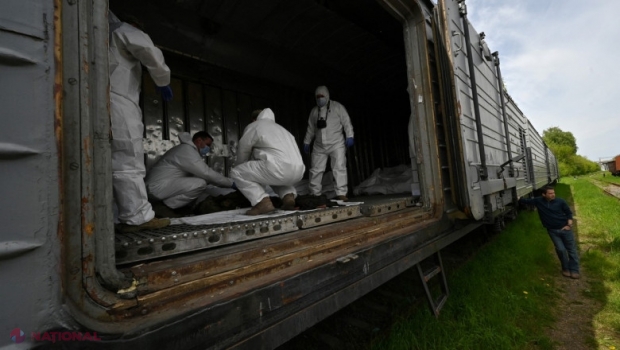 Tren frigorific plin cu cadavre de soldați ruși omorâți în Ucraina, lăsat în urmă de armata lui Putin. Moscova refuză să îi revendice