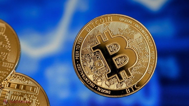 Bitcoin atinge un nou nivel record: 60.555,97 de dolari. Cum devine criptomoneda un pericol pentru climă