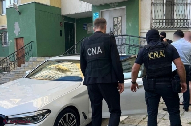 AUDIO // MITĂ de 1,5 milioane de lei, la Chișinău: Bani pretinși pentru a influența funcționari, inclusiv de la Primăria capitalei, pentru eliberarea de acte permisive și rezolvarea unui dosar de evaziune fiscală. „În business așă-i...”