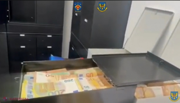 VIDEO // Grămezi de BANI și pistoale la o companie de transport din Chișinău. Firma e vizată într-un caz de evaziune fiscală de 3 500 000 de lei