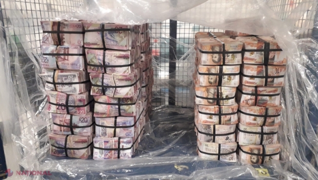 Cinci milioane de lire sterline confiscate, după ce polițiștii au văzut un bărbat clătinându-se sub greutatea genților cu bani 