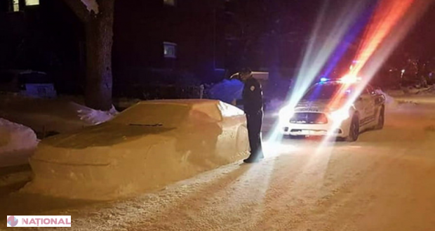 Imagini AMUZANTE // Polițiștii au confundat o mașină din zăpadă cu una reală!
